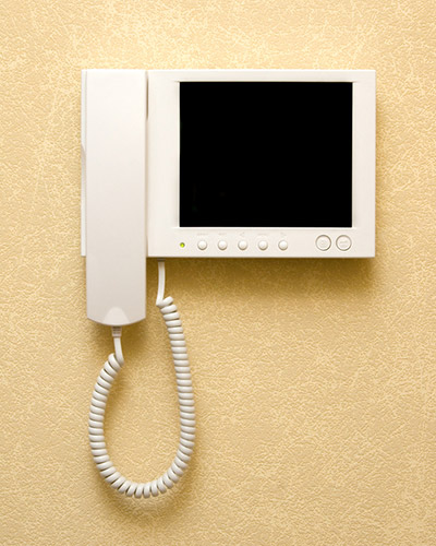 What is the difference between an intercom and paging?